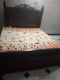 king size bed with double ply brown in color