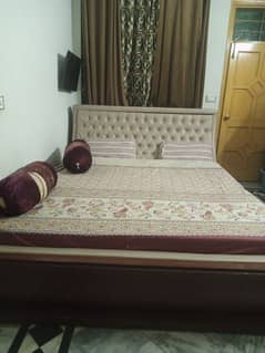 king bed with dressings and side tables 0