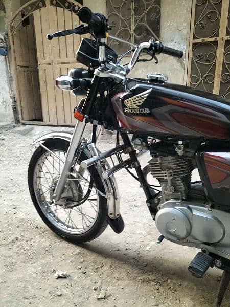 Atles Honda 125 8