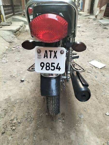 Atles Honda 125 15