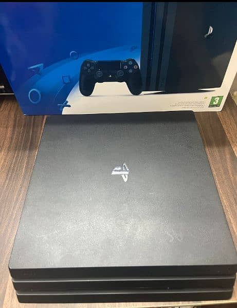 Playstation 4 pro 1 TB with Boxes 1