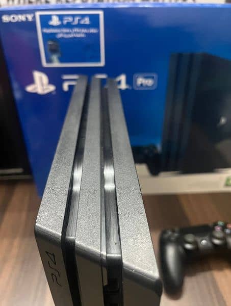 Playstation 4 pro 1 TB with Boxes 2