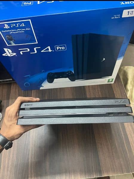 Playstation 4 pro 1 TB with Boxes 4