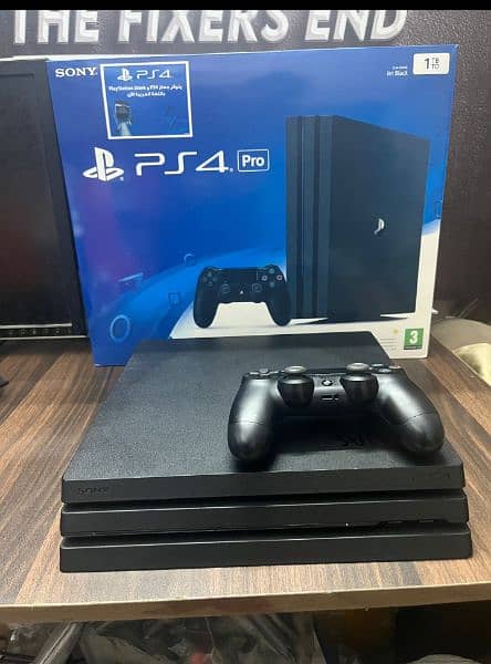 Playstation 4 pro 1 TB with Boxes 5