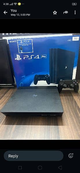 Playstation 4 pro 1 TB with Boxes 6