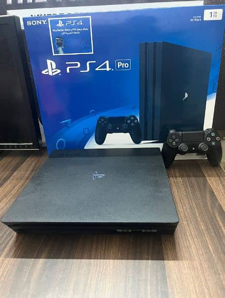 Playstation 4 pro 1 TB with Boxes 7