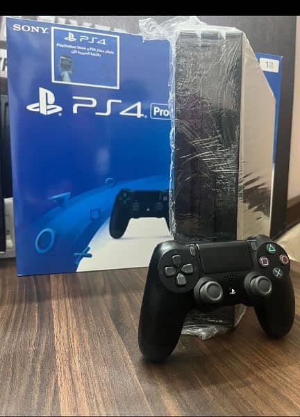 Playstation 4 pro 1 TB with Boxes 8