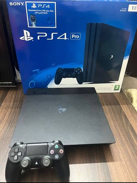 Playstation 4 pro 1 TB with Boxes 9