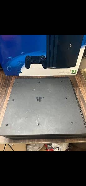 Playstation 4 pro 1 TB with Boxes 14