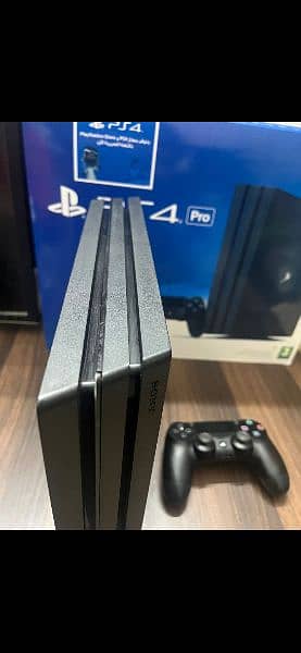 Playstation 4 pro 1 TB with Boxes 16