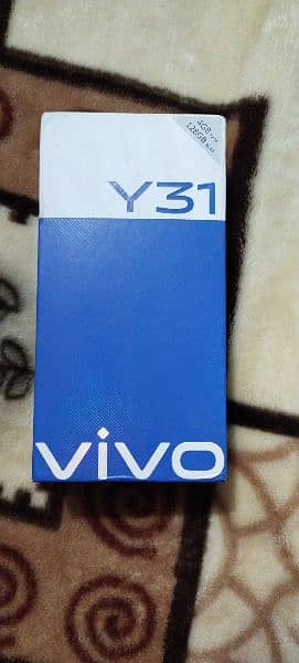vivo y 31 6/ 128 charger and box Available 1