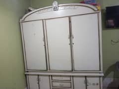 triple door wood cupboard in deco paint 0