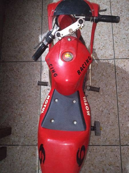 kids electric heavy bike with 2 brand new battery 3
