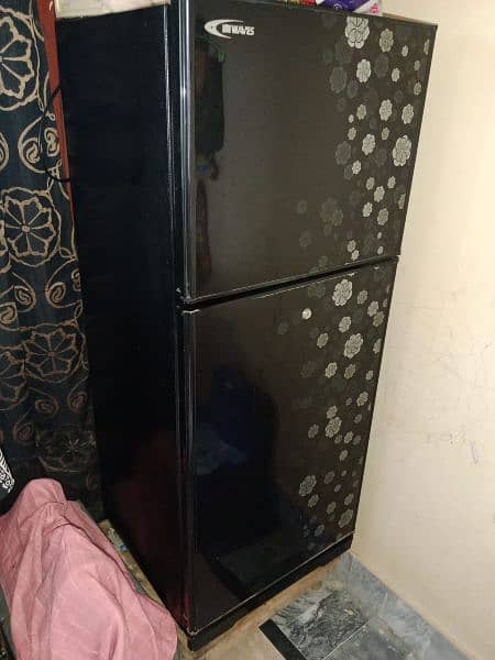 Small size glass door  colour black 4 years used condition Lush waves 2