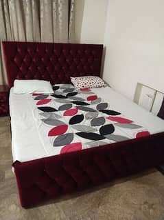 King size full cushion bed with 2 side tables