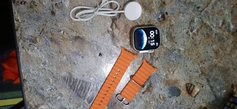 T900 ultra smart watch orange straps with box and wire less charger 1