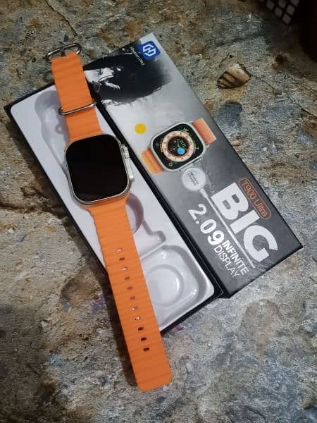 T900 ultra smart watch orange straps with box and wire less charger 3