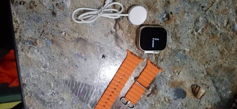 T900 ultra smart watch orange straps with box and wire less charger 4