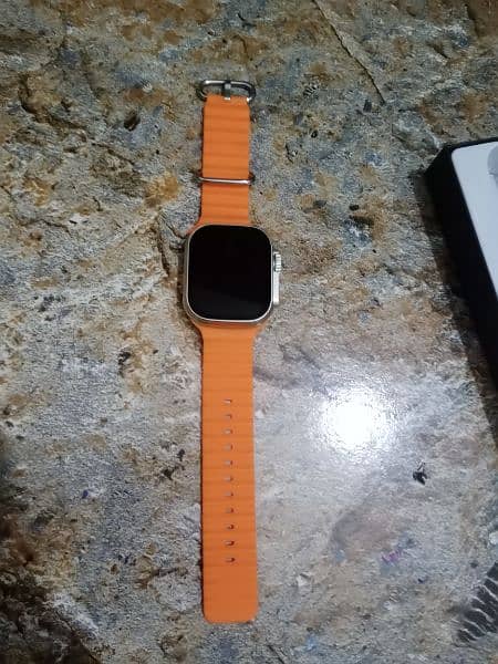 T900 ultra smart watch orange straps with box and wire less charger 5