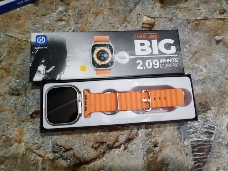 T900 ultra smart watch orange straps with box and wire less charger 6