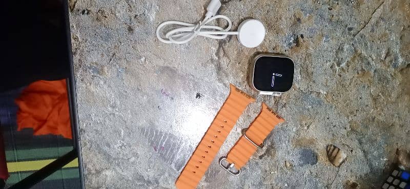 T900 ultra smart watch orange straps with box and wire less charger 7