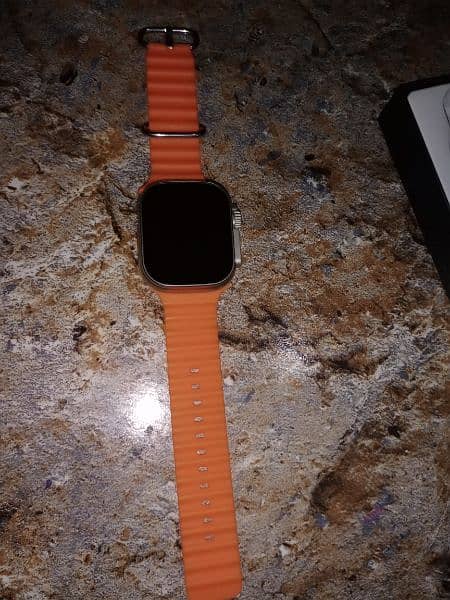 T900 ultra smart watch orange straps with box and wire less charger 8