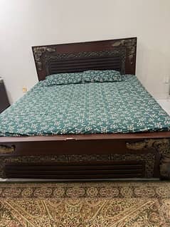 queen size wooden bed for sale.