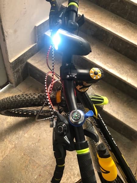 yellow brand new cycle 26 inch with lights installed 2