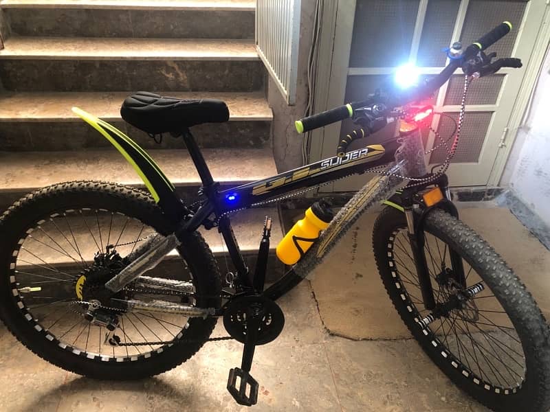 yellow brand new cycle 26 inch with lights installed 3