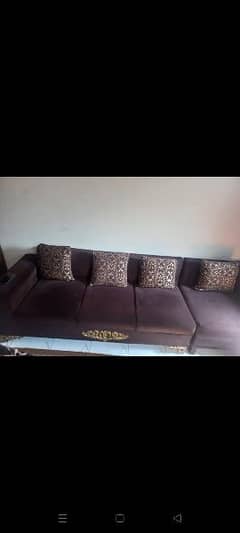 L shape sofa set along with table