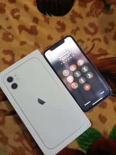 Iphone 11---64 gb,97% health, white colour one handed use, box