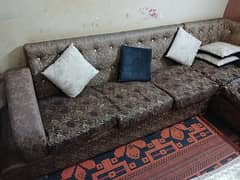 L Shaped Sofa with table. 0
