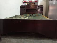 A wooden bed set