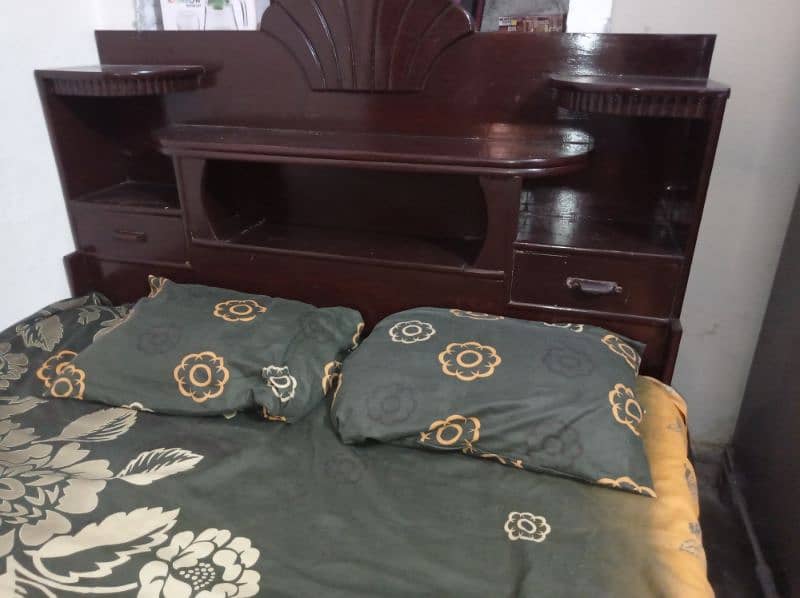 A wooden bed set 4