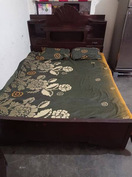 A wooden bed set 5