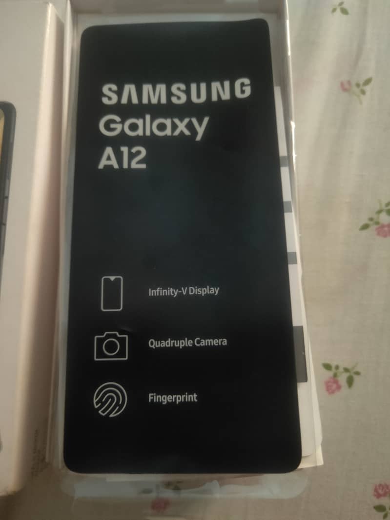 Samsung galaxy A12 original box and charger 10/10 PTA approved 128gb 7