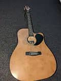 Acoustic jumbo size guitar
