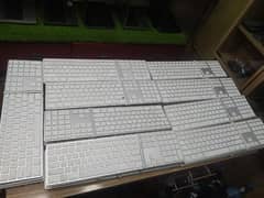 Apple keyboard in white colour with two ports quantity available