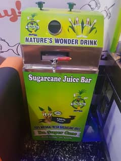 Modern sugarcane  juice machine and counter slightly used