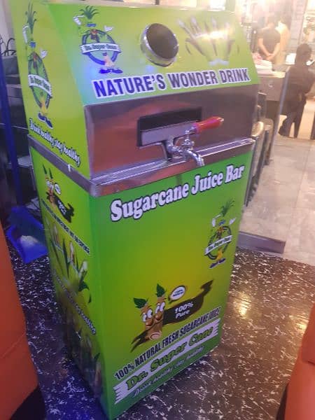 Modern sugarcane  juice machine and counter slightly used 3