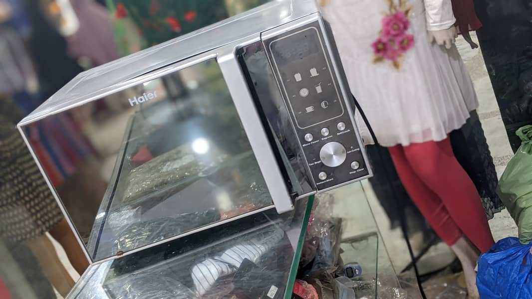 Haier 20L microwave oven awesome condition just buy it and use home us 6