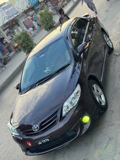 Corolla Gli 2013 only Door shower like new condition 80%tires v