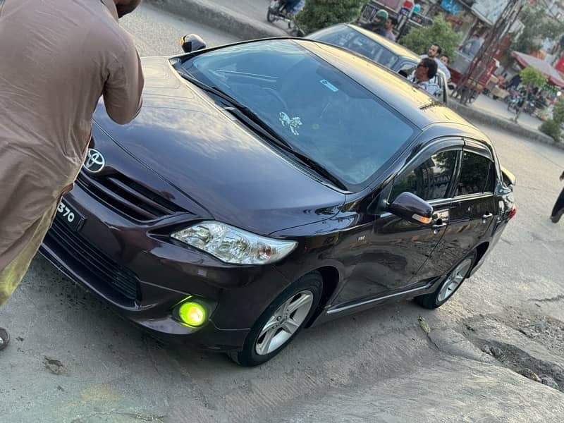 Corolla Gli 2013 only Door shower like new condition 80%tires v 1