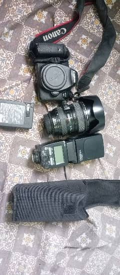 Canon 6D with 24-105 lens and flash gun