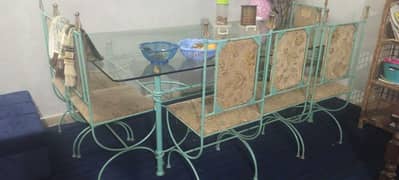 iron dining table is good condition 6 chair full size