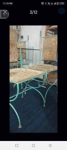 iron dining table is good condition 6 chair full size 15