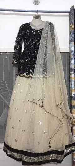 three piece lehnga and peplum ftock in blak and golden color 0