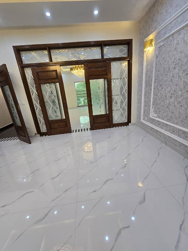 10 Marla Brand new modern House Available for sale in Talha Block Bahria Town Lahore 10