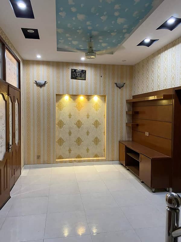 5 Marla house Available in low budget in sector B bahria town lahore 9