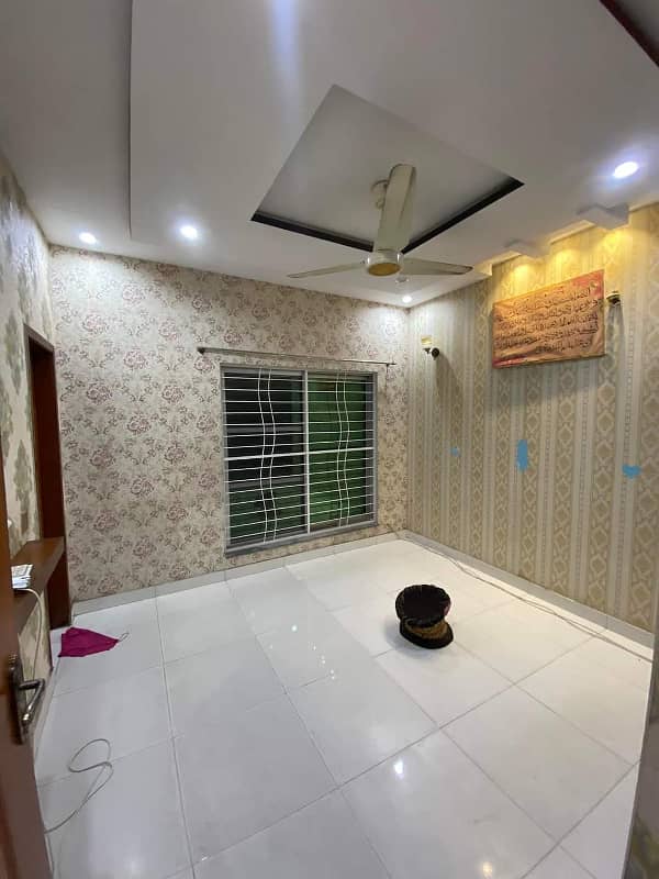5 Marla house Available in low budget in sector B bahria town lahore 11